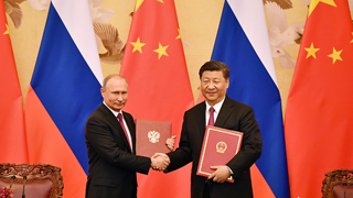  “友谊勋章”开创新时代外交新局