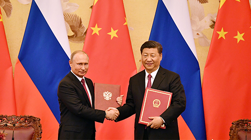 习近平颁授普京首枚“友谊勋章”