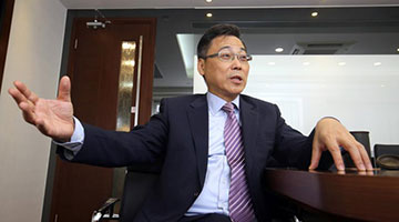 改革开放40年 | 乘开放东风 林德兴靠 “脑”成就事业