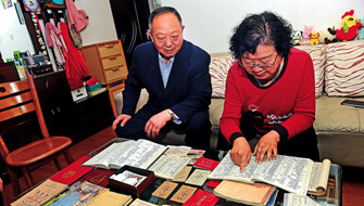 ﻿青岛夫妇20本帐簿见证改革开放40年巨变 工资增长141倍