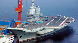 海军新闻发言人就山东舰入列有关问题答记者问