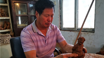 王忠富：浓浓乡土韵 指尖泥塑人