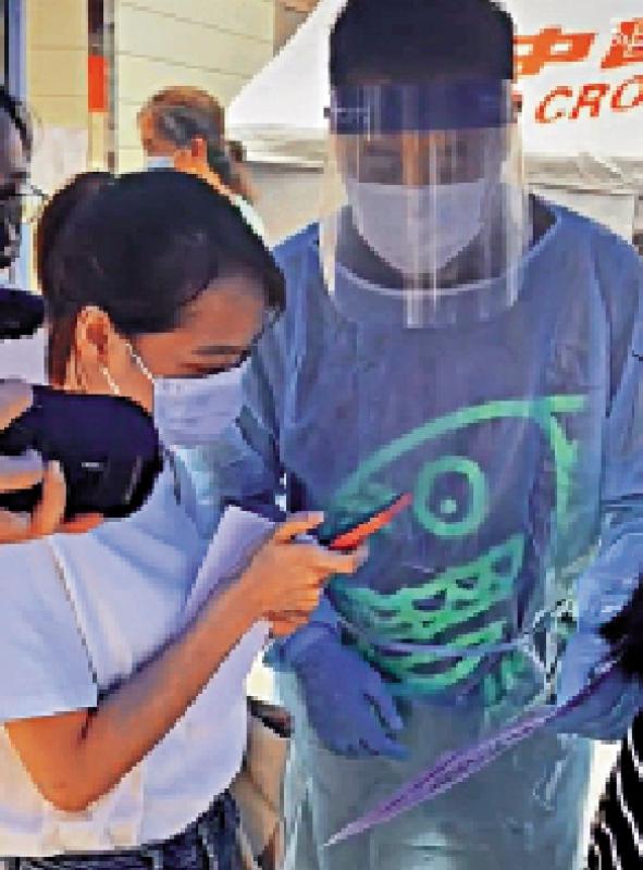 ﻿不想斋讲/广州街头做志愿者