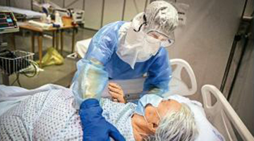 公评世界 | 大国“抱团取暖”错位 全球遏制新冠未果