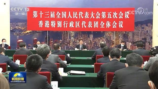 韩正分别参加香港代表团、澳门代表团审议
