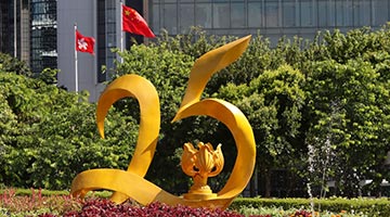 习近平会见贺一诚