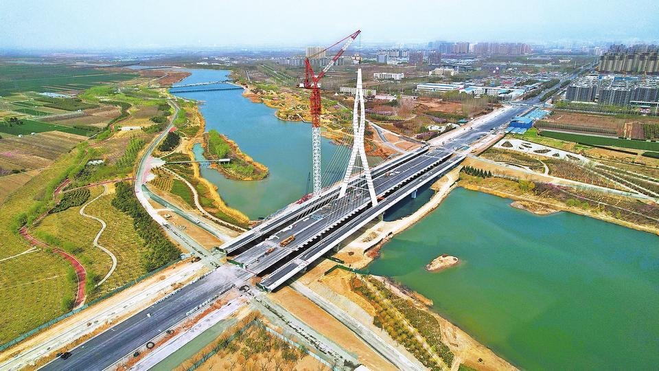 顺利封顶促当地经济发展