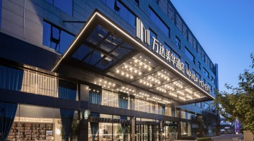 万达酒店发展：预计上半年公司拥有人应占溢利最低约1.4亿港元