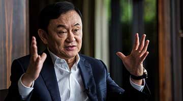 泰国前总理他信被判三项罪名成立 被判处8年监禁