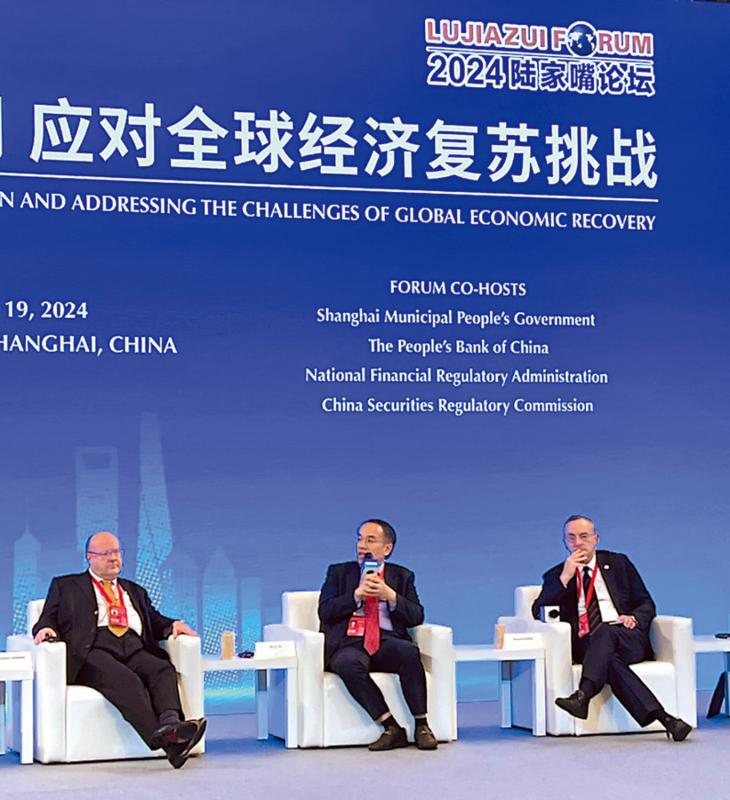 紧密磋商/许正宇：争取人币柜台纳入港股通