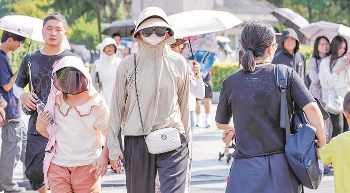 湖北54站高温破纪录 部分学校停课或延迟开学