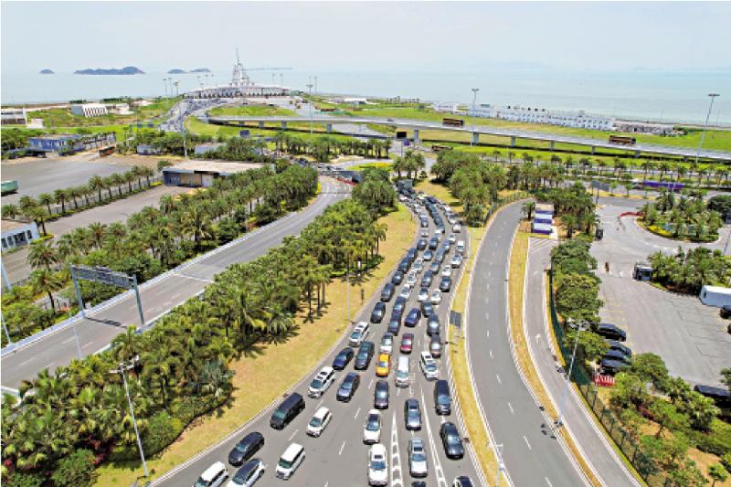 ﻿明观四海/港珠澳大桥引领湾区融合发展\梁海明