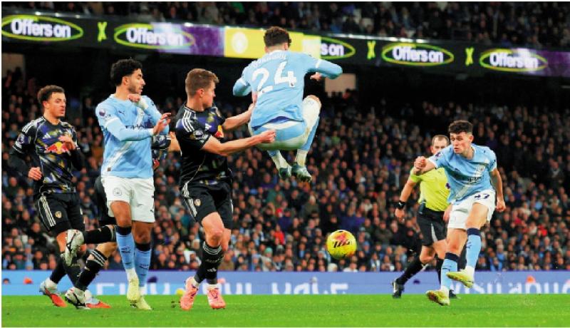 ﻿科顿梅开二度助曼城奠胜