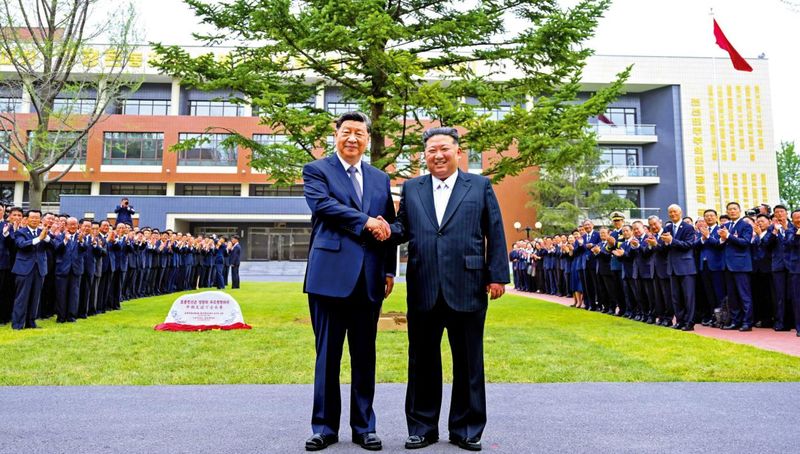 与金正恩就发展新时代中朝关系达成重要共识 习近平：中朝未来发展方向更加明确清晰